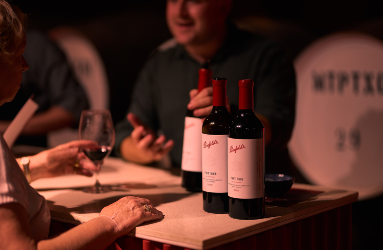 Two Penfolds wines placed alongside each other on a table